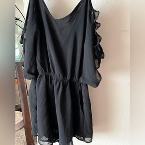 Sexy mini romper, off the shoulder look with built in slip. Great condition